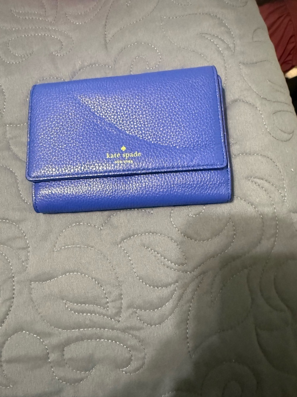 kate spade Pebbled Leather Trifold Wallet in Royal Blue